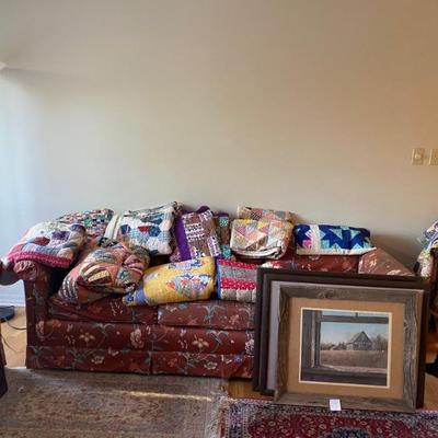 Several beautiful handmade vintage quilts