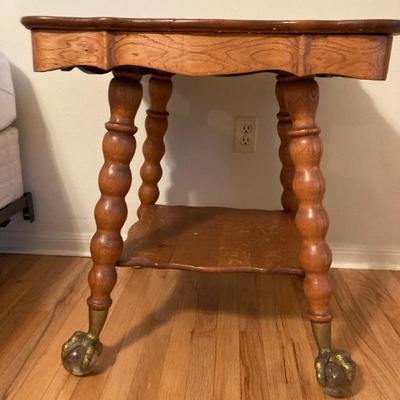 Antique oak table with large glass and claw feet