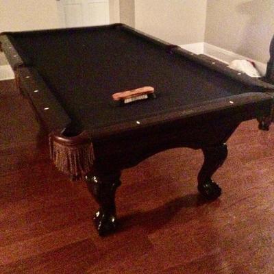 Large pool table disassembled 