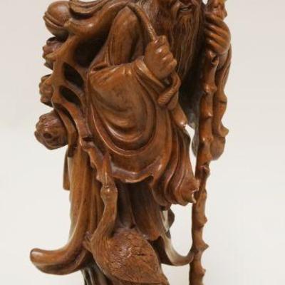 1181	INTRICATE ASIAN WOOD CARVING OF A MAN W/WALKING STICK & BIRDS, APPROXIMATELY 14 1/4 IN HIGH
