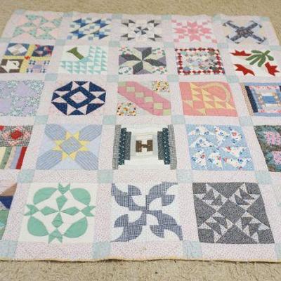 1037	ANTIQUE HAND SEWN SAMPLER QUILT, APPROXIMATELY 6 FT 4 IN X 6 FT 4 IN
