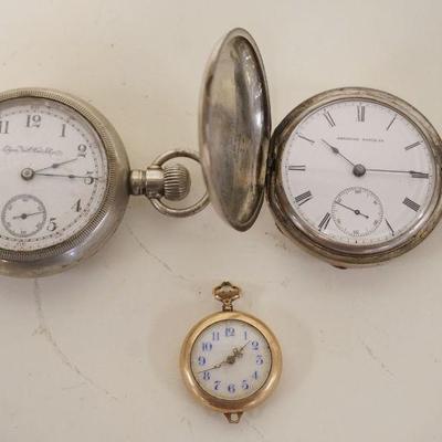 1027	3 POCKET WATCHES, NOT WORKING FOR PARTS INCLUDING ELGIN & AMERICAN WATCH CO
