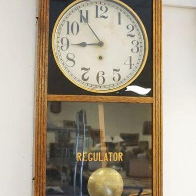 1021	ANTIQUE SESSIONS OAK CASE REGULATOR WALL CLOCK, NOTE CLAIMING IT ONCE HUNG IN WASHINGTON NJ LIBRARY, APPROXIMATELY 5 IN X 17 IN X 38...