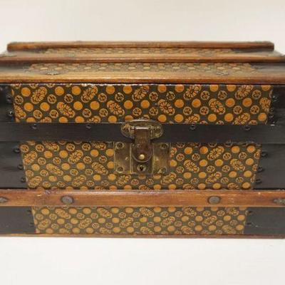 1045	MINIATURE VICTORIAN EMBOSSED TIN & WOOD TRUNK, W/INTERIOR TRAY, INTERIOR RELINED, APPROXIMATELY 9 IN X 18 IN X 10 IN HIGH
