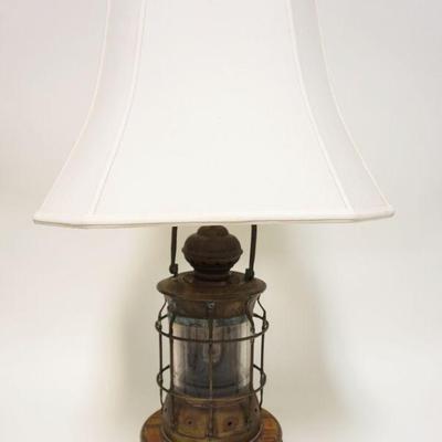 1001	LARGE BRASS NAUTICAL MARITIME SHIPS LANTERN, HAS BEEN ELECTRIFIED, APPROXIMATELY 31 IN HIGH OVERALL
