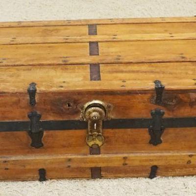 1082	ANTIQUE WOOD & METAL STORAGE TRUNK W/LEATHER HANDLE SIDES, APPROXIMATELY 22 IN X 36 IN X 14 IN HIGH
