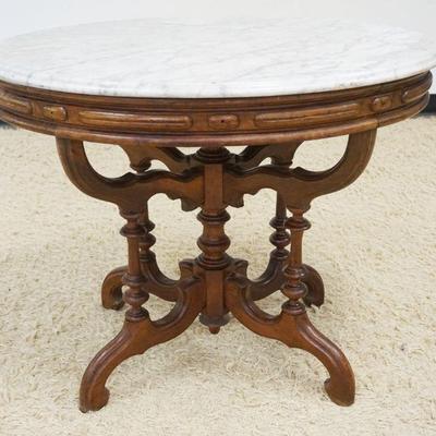 1080	VICTORIAN OVAL MARBLE TOP TABLE, APPROXIMATELY 26 IN X 36 IN X 29 IN HIGH
