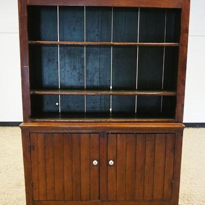 1059	ANTIQUE PINE 2 PIECE STEP BACK CUPBOARD OVER 2 DOORS, APPROXIMATELY 55 IN X 17 IN X 76 IN HIGH
