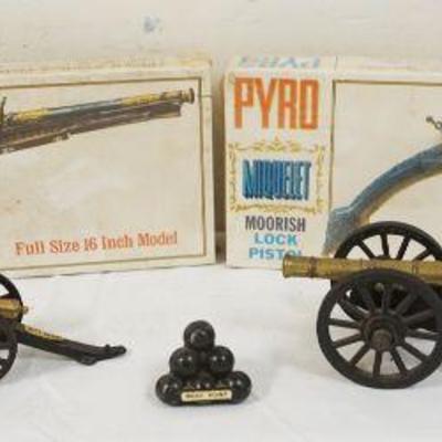 1162	LOT INCLUDING 2 VINTAGE SEALED PISTOL KITS, CAST METAL CANONS & CANON BALLS, 2 MARKED WEST POINT, LARGEST CANON APPROXIMATELY 7 IN X...