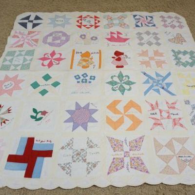 1042	ANTIQUE HAND SEWN SAMPLER QUILT, APPROXIMATELY 6 FT 2 IN X 6 FT 6 IN

