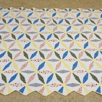 1036	ANTIQUE HAND SEWN QUILT, APPROXIMATELY 6 FT 7 IN X 5 FT
