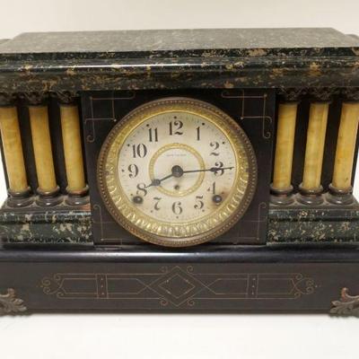 1149	SETH THOMAS VICTORIAN MANTLE CLOCK IN EBONIZED & FAUX MARBLE WOOD CASE W/METAL MOUNTS & GARNITURES, APPROXIMATELY 18 IN X 7 IN X 11...