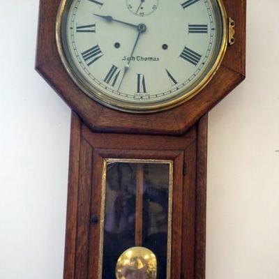 1024	ANTIQUE SETH THOMAS OAK CASE WALL CLOCK, APPROXIMATELY 16 IN X 32 IN HIGH

