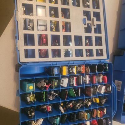 Two Matchbox carrying cases, each has over 75 cars in them