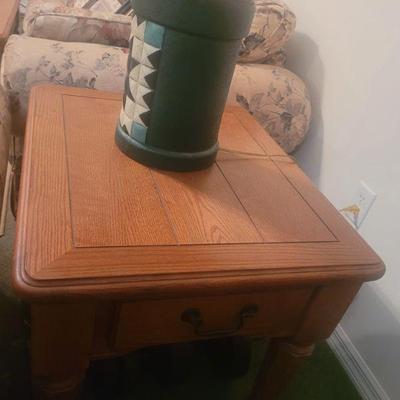 One of two end tables that match the coffee table