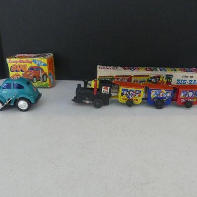 Vintage 1970s MTLI Wind-Up Zig-Zag Express Train and Wind-Up Whistling Sound Funny Whistling Bug