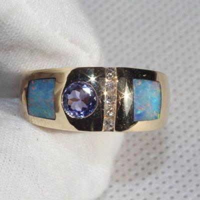 OPAL RING TANZANITE DIAMOND 14K GOLD OPAL

https://www.liveauctioneers.com/item/147048294_opal-ring-tanzanite-diamond-14k-gold-opal