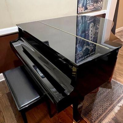 Yamaha Gloss Black Baby Grand Piano - a GH1 from 1991 made in Japan for the American market. Absolutely pristine, maintained and tuned by...