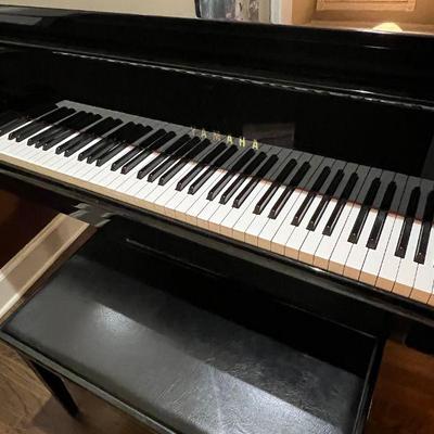 Yamaha Gloss Black Baby Grand Piano - a GH1 from 1991 made in Japan for the American market. Absolutely pristine, maintained and tuned by...