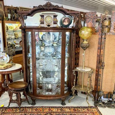 Late 19th century Northwind curved glass china cabinet