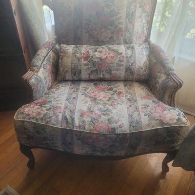 This is one of two floral print chairs, neither has any stains or tears in the fabric