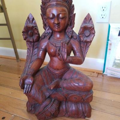 Large carved wooden statuette of goddess Green Tara