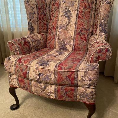 Upholstered wing-back chairs