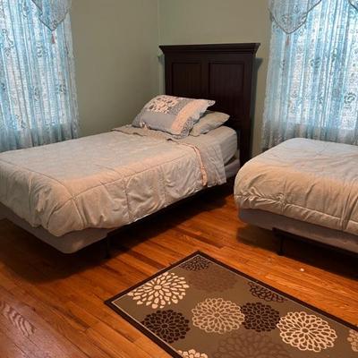 2 matching twin beds