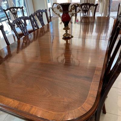 Beautiful table with 3 22 inch leaves available that lengthens it to 166 inches and 10 chairs