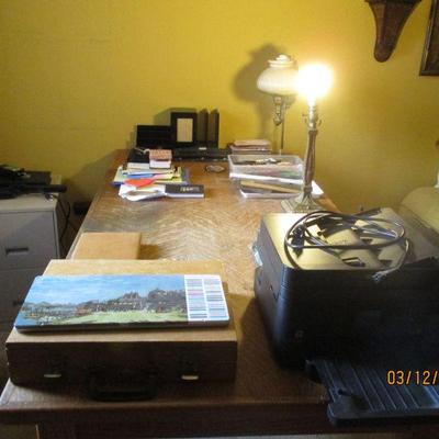 Antique oak desk and vintage lamps.
