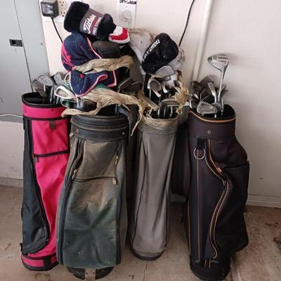 The golf clubs and bags