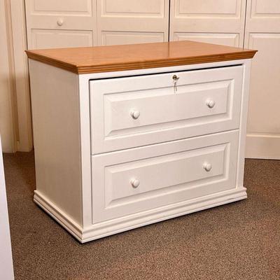 Inwood Furniture Mfg. File Cabinet |    White painted with a light wood top, two drawers
Dimensions: l. 37.5 x w. 22 x h. 30.5 in 