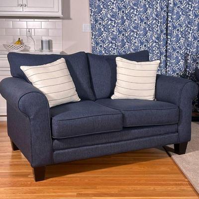 Fusion Furniture Blue Twill Loveseat |   Blue sofa / couch of small size with a pair of striped pillows
Dimensions: l. 65 x w. 37 x h. 31...