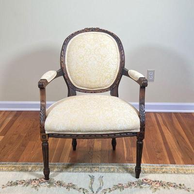 French Bergere Chair | Wood frame with ribbon and acanthus leaf carvings, cushioned upholstery
Dimensions: l. 23 x w. 25 x h. 34 in 