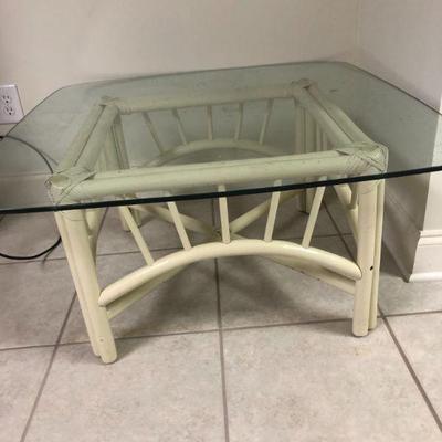 small rattan side table with glass top