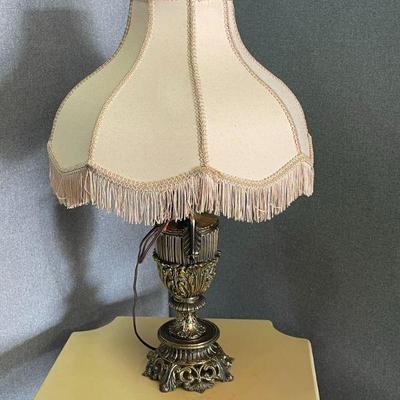 pair of heavy decorative lamps with shades