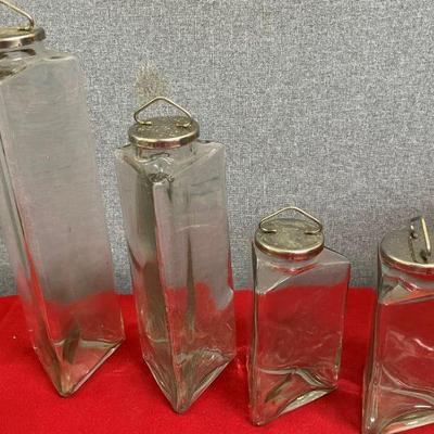 4 multi size containers with handled  lids