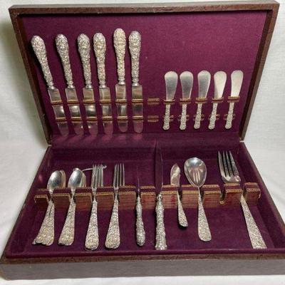 Set of Stieff “Repoussé” flatware to include 6 dinner knives, 5 butter spreaders, 8 teaspoons, 6 dinner Forks, master butter knife,...