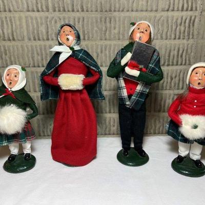
Byers Choice Ltd The Carolers 1987 family to include man with package, lady with cape and muff, girl with green jacket and muff, girl...