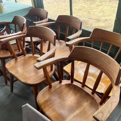 There is a set of eight of these sturdy vintage captains chairs,.
