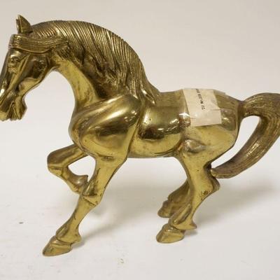 1132	SOLID BRASS HORSE	SOLID BRASS HORSE, APPROXIMATELY 9 IN HIGH
