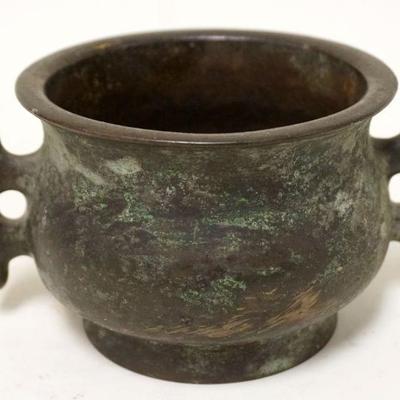 1155	ASIAN BRONZE DOUBLE HANDLED POT	ASIAN BRONZE DOUBLE HANDLED POT W/CHARACTER MARKS ON BASE, POT HAS CRACK, APPROXIMATELY 3 1/2 IN HIGH
