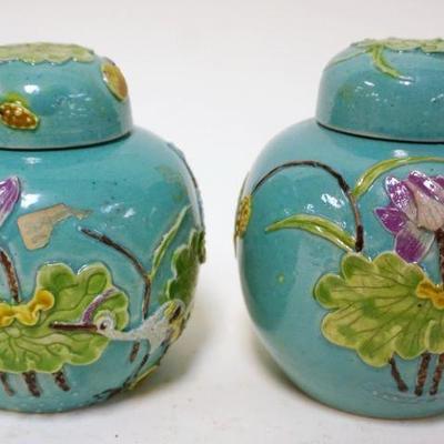 1113	2 ASIAN COVERED JARS	2 ASIAN COVERED JARS, APPROXIMATELY 4 1/2 IN
