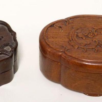 1007	GROUP OF 2 CARVED WOOD BOXES	GROUP OF 2 CARVED WOOD BOXES, LARGEST APPROXIMATELY 3 IN X 4 1/2 IN X 2 IN HIGH
