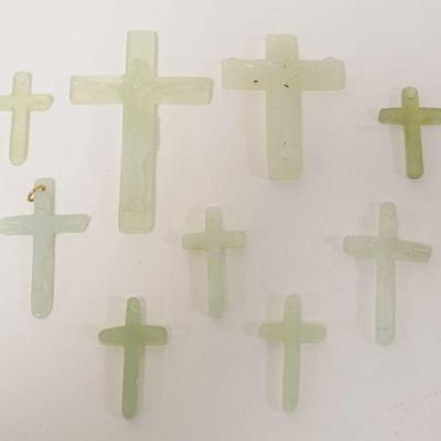 1247	9 PIECES JADE CHRISTIAN CROSSES, LARGEST APPROXIMATELY 4 IN HIGH
