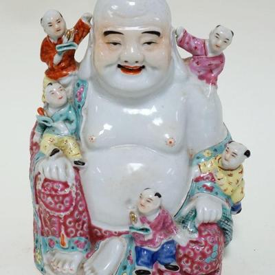 1029	ASIAN POTTERY FIGURE OF A MAN	ASIAN POTTERY FIGURE OF A MAN SITTING, APPROXIMATELY 8 IN HIGH
