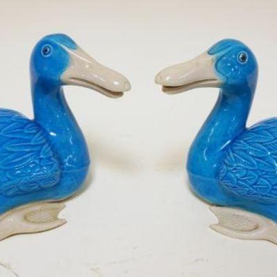 1030	PAIR OF BLUE & WHITE POTTERY DUCKS	PAIR OF BLUE & WHITE POTTERY DUCKS
