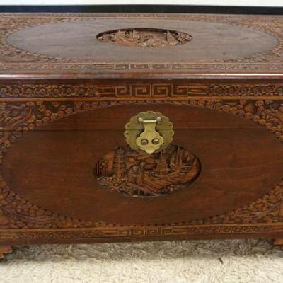 1073	ORNATE CARVED ASIAN CAMPHOR WOOD CHEST	ORNATE CARVED ASIAN CAMPHOR WOOD CHEST, DOVETAILED, APPROXIMATELY 41 IN X 21 IN X 24 IN HIGH
