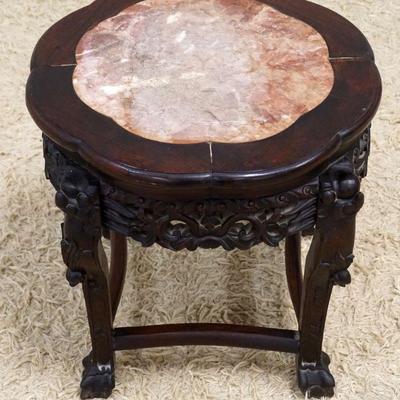 1062	ASIAN INSET MARBLE TOP CARVED WOOD TABLE	ASIAN INSET MARBLE TOP CARVED WOOD TABLE, APPROXIMATELY 18 I X 18 IN HIGH
