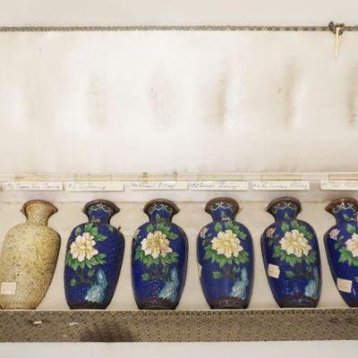 1104	CLOISONNE BOX CONTAINING 8 VASES	CLOISONNE BOX CONTAINING 8-6 1/2 IN HIGH VASES SHOWING THE VARIOUS STAGES OF MAKING
